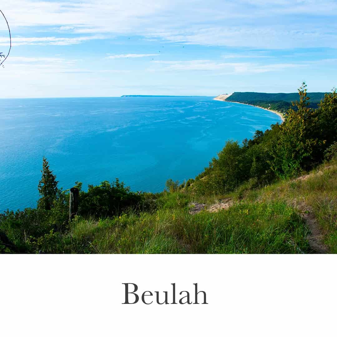 Overlooking Lake Michigan and the sand dunes near Beulah, Michigan, highlighting scenic waterfront properties.